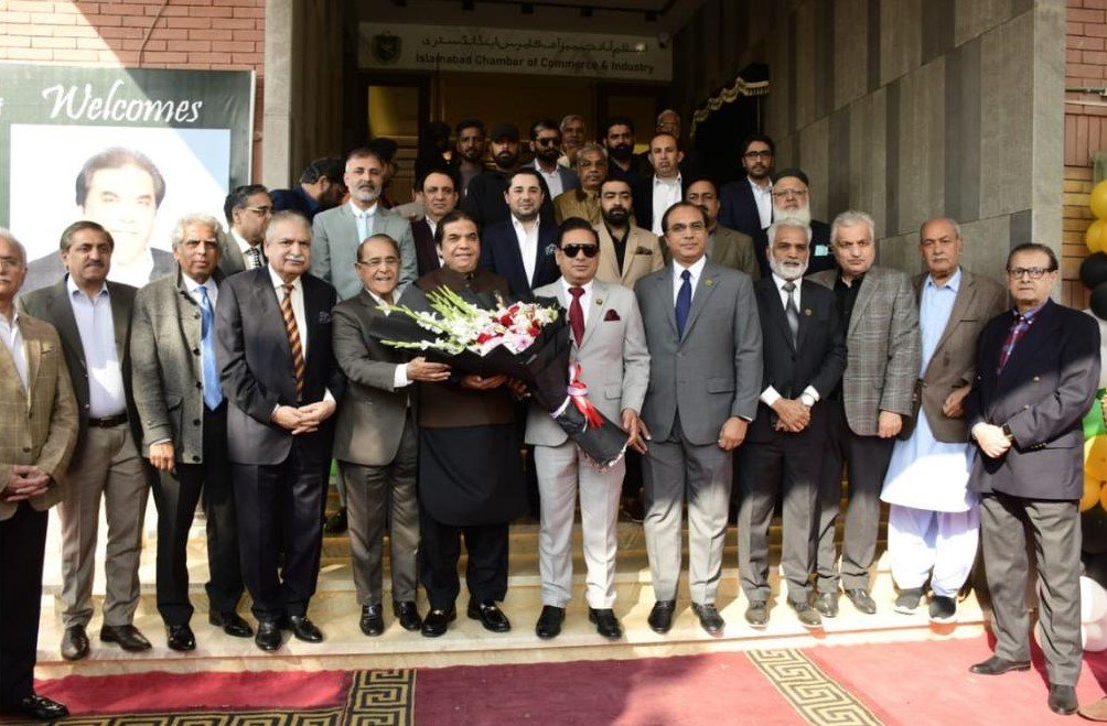 Federal minister Hanif Abbasi at ICCI event discussing reforms for the business community.