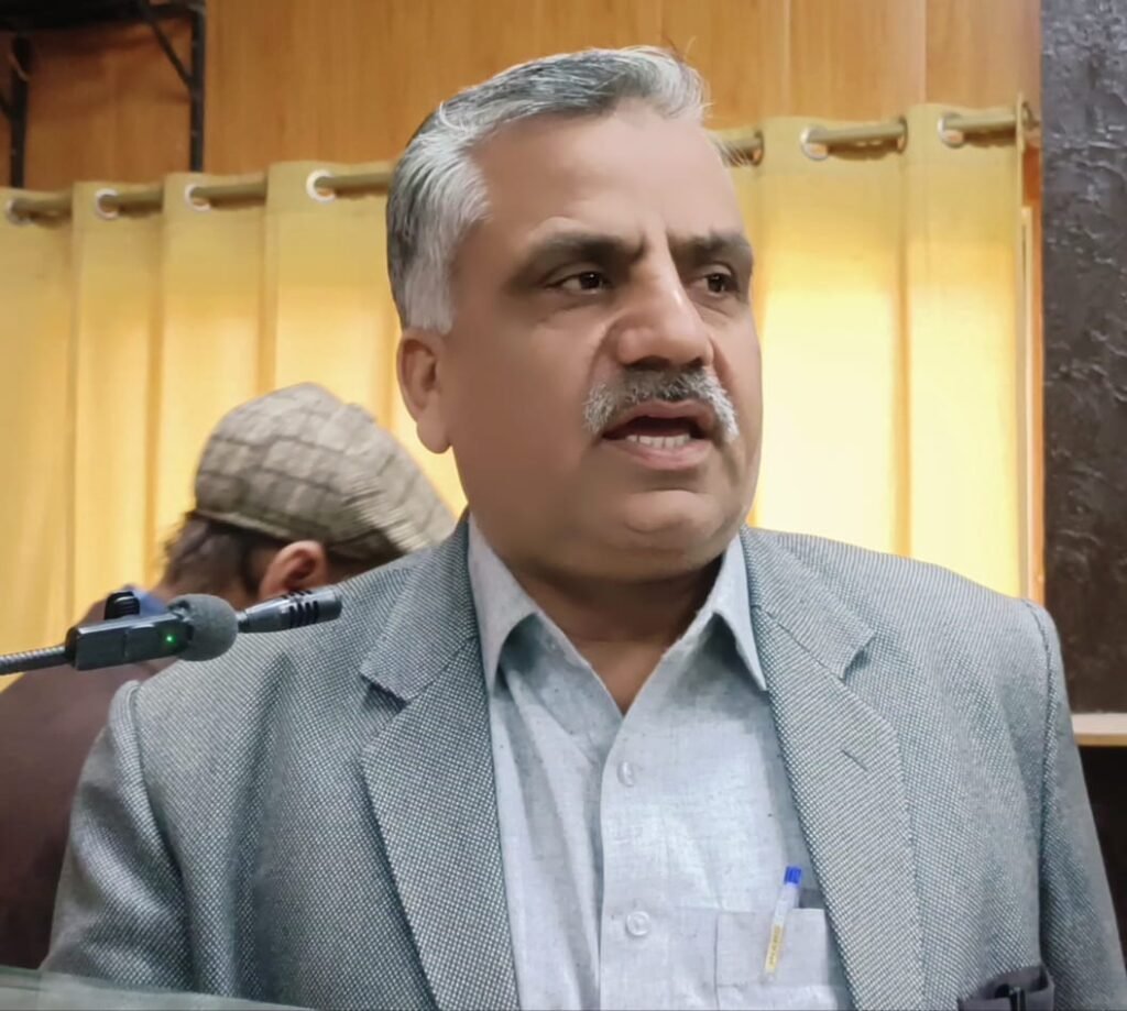 Pakistan Press Council chairman meeting Abbottabad journalists during press club visit.