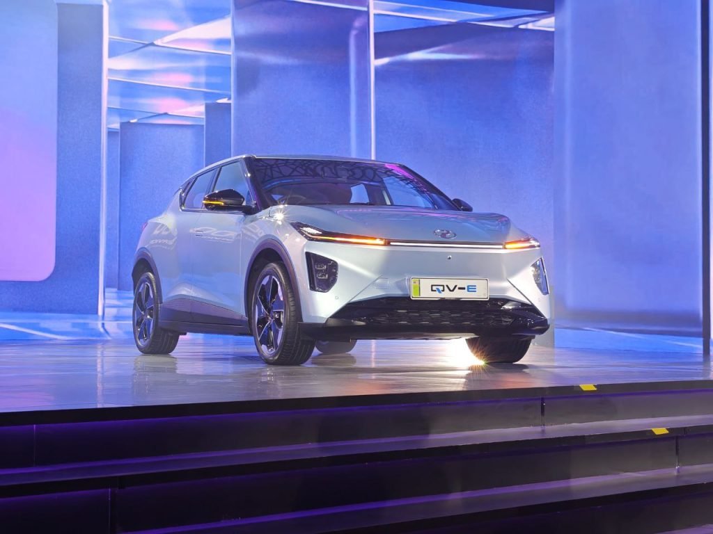 Perodua displays the QV-E electric crossover during its official launch event.