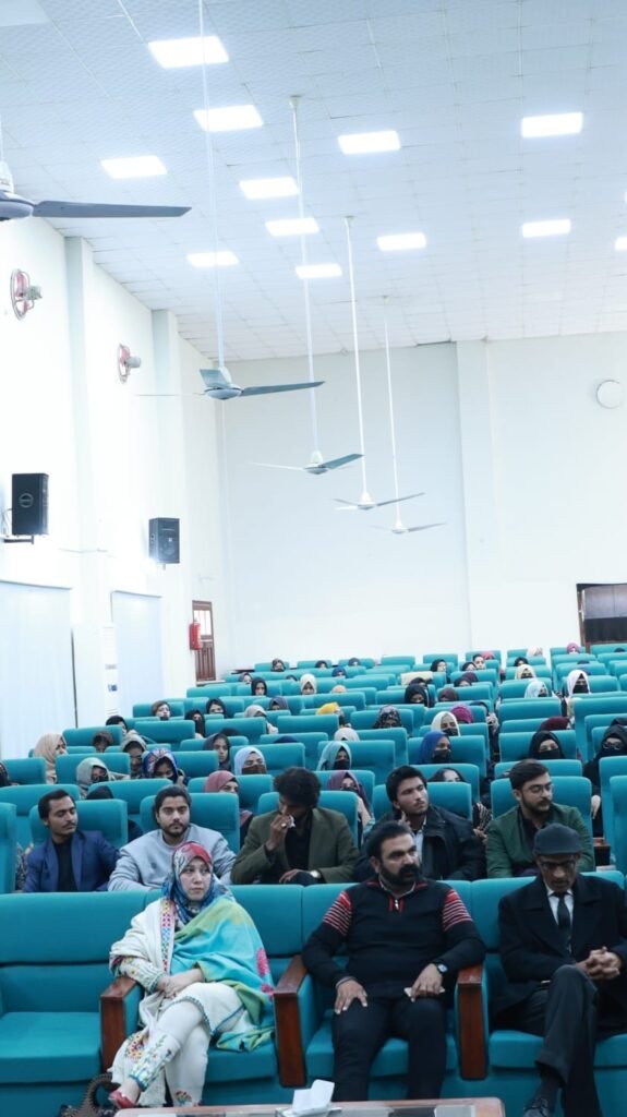 Audience attending a condolence reference in honour of Professor Sufi Liaqat at the University of Chakwal.