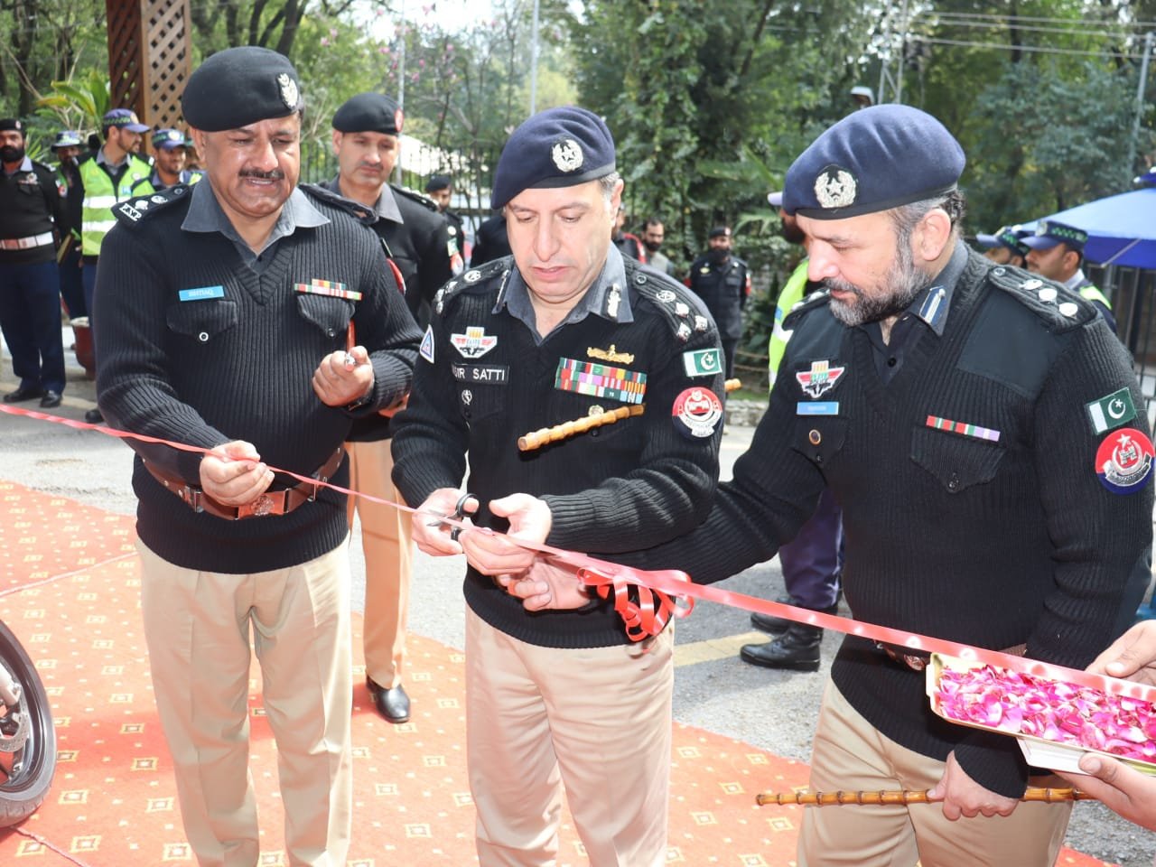DIG Hazara Nasir Mahmood Satti inaugurates Traffic Shaheen Squad in Abbottabad with modern traffic police equipment.