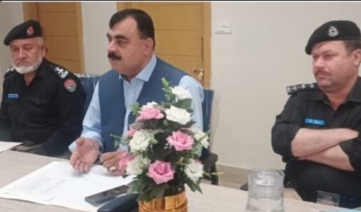 Timergara police officials meet local elders to discuss crime prevention and law and order.